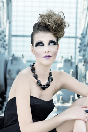 Beautiful fashion model looking up, blue eyesの写真素材