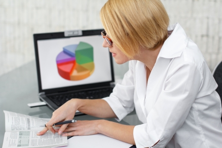 Accountant searching for laws, officeの写真素材