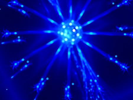 Glowing blue virus, blurred abstract background, computer generatedの写真素材