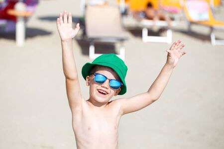 Happy little boy enjoying the summer holidayの写真素材