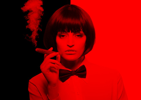 Sexy mafiosi woman in tux subtracted red color styleの写真素材