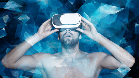 Naked man with virtual reality glasses in polygonal virtual world