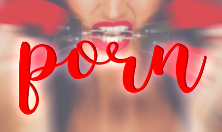 Sexy woman with red lips bite handcuffs banner, word porn, bdsmの写真素材