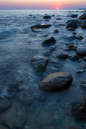 Colorful seashore of Elia Nikiti long exposure portrait, Chalkidiki, Greeceの写真素材