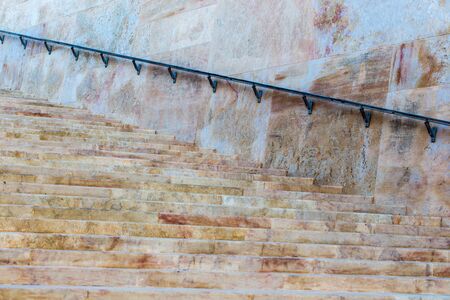 Wide marble stairway with railing at Valleta, Malta