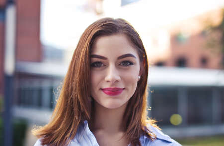 Young freelancer Caucasian programmer woman working on laptop in parkの写真素材