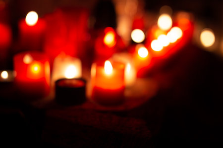 Blurred warm burning candlelights background templateの写真素材