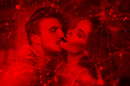 Sexy passionate couple foreplay at home with online connections concept in red light, red lips, closed eyes, lustの写真素材