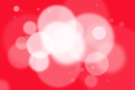 Red Bokeh Background.Defocused abstract red christmas backgroundの写真素材