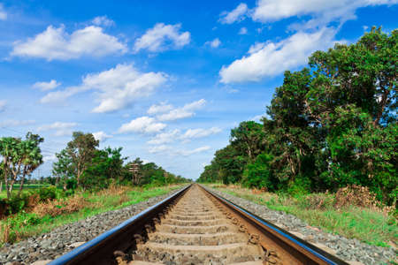 Railroad track and blue skyの写真素材