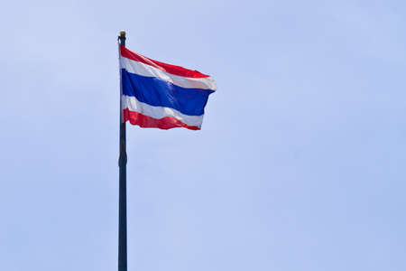 flag of Thailand with blue sky background.の写真素材