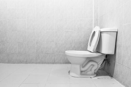 White toilet bowl in a bathroomの写真素材