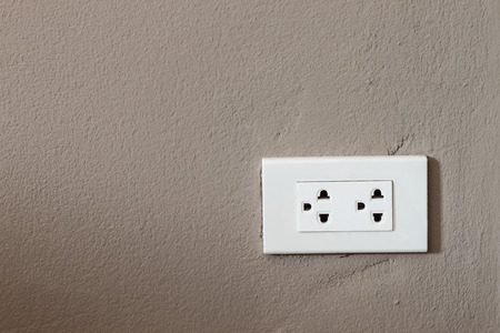 Electric outlet on the wall