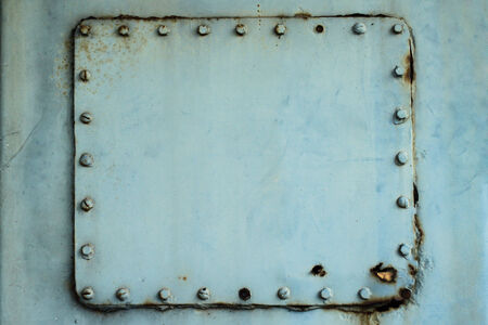grunge background metal plate with screws