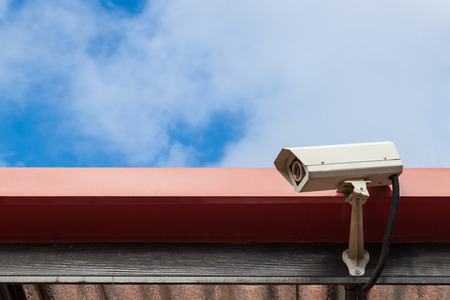 Security camera or cctv  on blue sky background