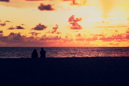 lover watching sunset at the sea.vintage styleの写真素材
