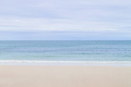 beach and tropical sea with blue skyの写真素材