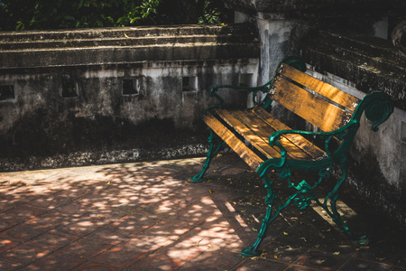 Wooden bench in the  parkの写真素材