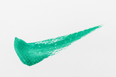 check mark from watercolor on white paperの写真素材