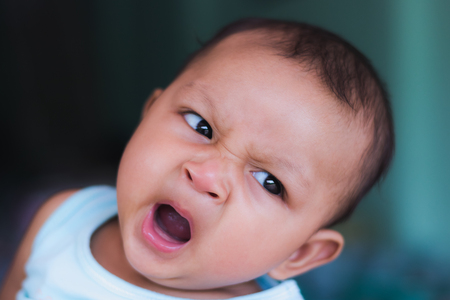 Closeup yawning baby, Asian infant