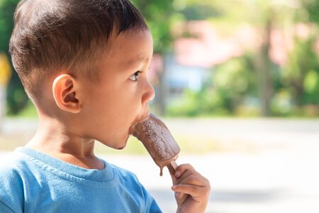 Cute Toddler boy Eating Ice-Creamの写真素材