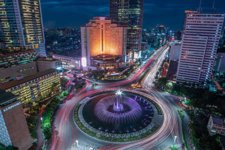 Jakarta, Indonesia - March 6, 2019 :  The famous Jakarta's landmark, Bundaran HI and you can enjoy the beautiful night view from your apartmentのeditorial素材