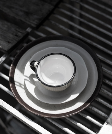 The plate and glass tile with light and shadow.の写真素材