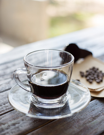 Black coffee and coffee beans, Coffee bean grinder, Drip coffee.の写真素材