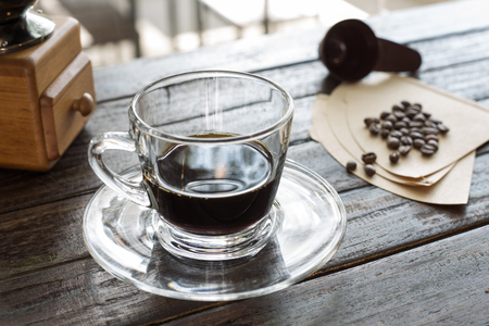 Black coffee and coffee beans, Coffee bean grinder, Drip coffee.の写真素材