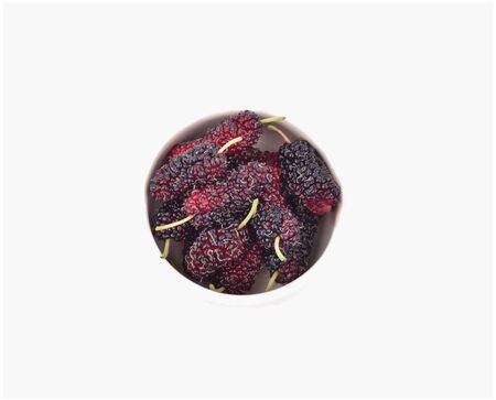 Fresh mulberry in the bowl isolated on white background