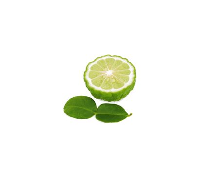 A Half of bergamot fruit with green leaf isolated on white backgroundの写真素材