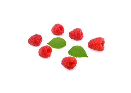 Raspberry with leaves isolated on white background.