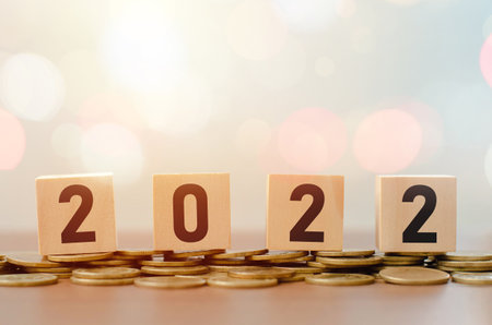 wooden block with number 2022 in new beginning happy new year with bokeh background