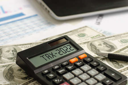 tax assistance with dollar-denominated banknotes On the display of the 2022 calculator, tax...