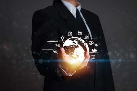 Business people hold a network structure like global internet connection metaverse. Global business...