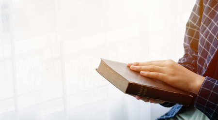 Christian Crisis Prayer to God Woman praying for God's blessing for a better life. Human hands...