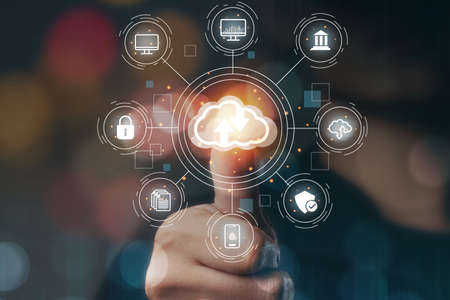 cloud computing in hand with icons cloud technology data storage, memory, document, business woman with thumbs touch in the concept of network and internet servicesの写真素材