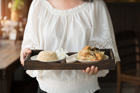 Chef serving brown rice and vegetarian food.Healthy food menu ,delicious and good for healthの写真素材