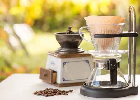 Coffee break . Drip coffee in the parkの写真素材