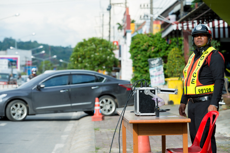 PHUKET-NOVEMBER 3,2016:Police set up portable wheel load scales for determining the weight of heavy vehicles on the road to patong beach Provides public roads and optimal protection if used for maximum load allowed for law enforcement and could reduce roaのeditorial素材