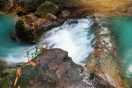Waterfall landscape at sunrise,long exposure.
Water always flow downward,Travel destination at Salika waterfall,Nakornnayok,Thailand.の写真素材