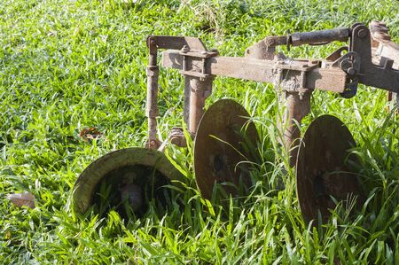 Close-up Tractor plow on Lawn, Thailandの写真素材