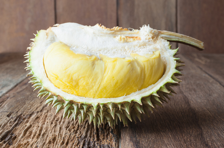 yellow Durian on wood tableの写真素材