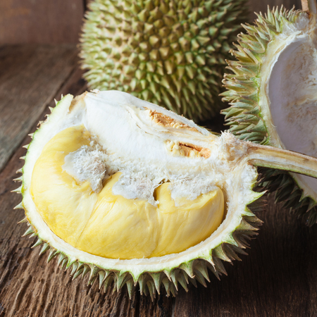 yellow Durian on wood tableの写真素材
