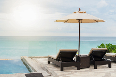 sunbed with a beautiful beachの写真素材