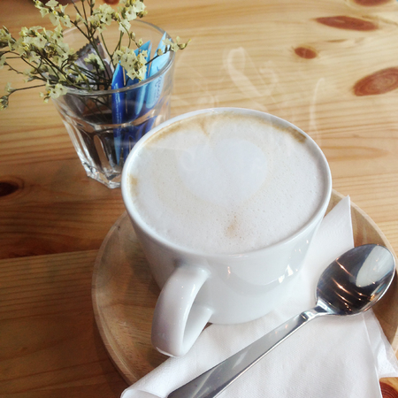 Hot coffee  on wood tableの写真素材