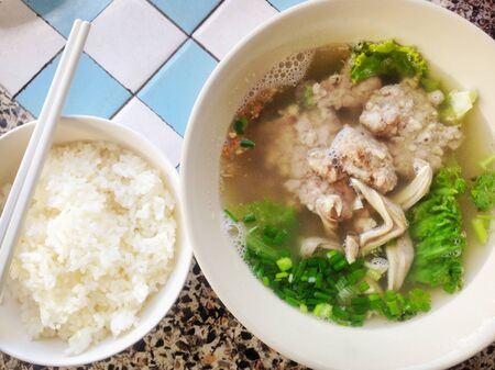 Ekaehla with rice on table