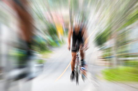 radial blurred bike race on streetの写真素材