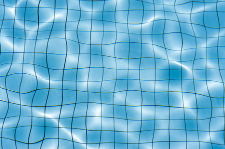 Light Blue swimming pool rippled water texture reflection