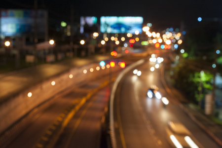 blurred background top view of a street night with traffic lightsの写真素材